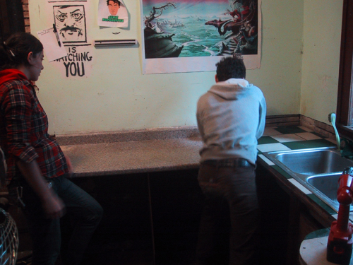 anna and andrew taking apart the old counter